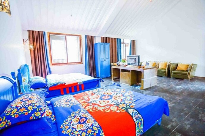 Imagen de la habitación del Hotel Yiyun Botique Inn Taierzhuang Old Town. Foto 22