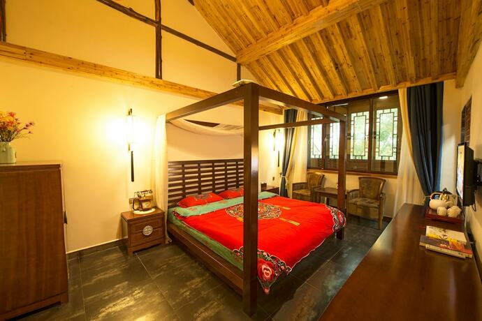 Imagen de la habitación del Hotel Yiyun Botique Inn Taierzhuang Old Town. Foto 24
