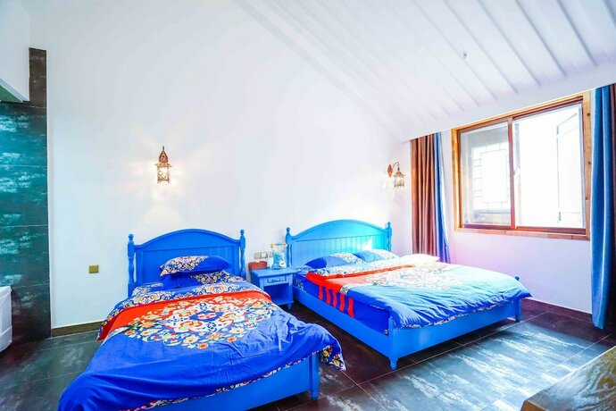 Imagen de la habitación del Hotel Yiyun Botique Inn Taierzhuang Old Town. Foto 32