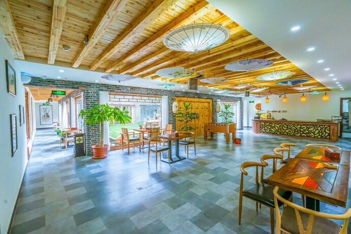 Imagen de los interiores del Hotel Yiyun Botique Inn Taierzhuang Old Town. Foto 33