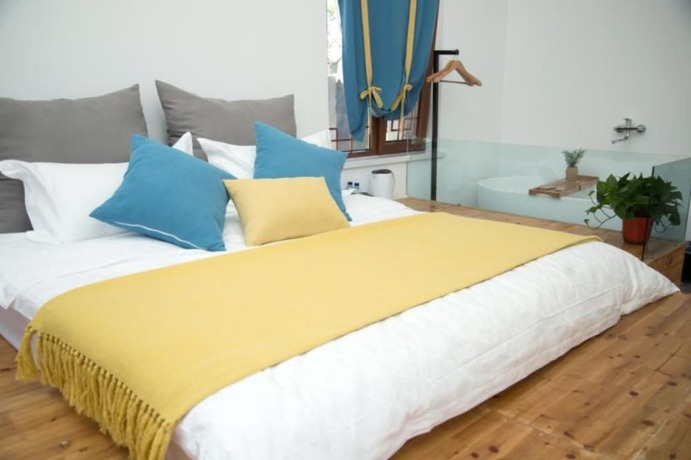 Imagen de la habitación del Hotel Yiyun Chunshe Meisu Hebi. Foto 9