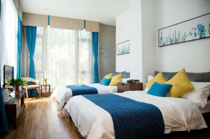 Imagen de la habitación del Hotel Yiyun Chunshe Meisu Hebi. Foto 10