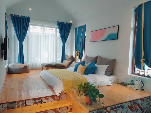 Imagen de la habitación del Hotel Yiyun Chunshe Meisu Hebi. Foto 12