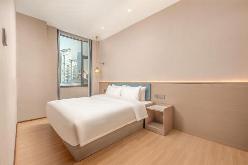 Imagen general del Hotel Yizhi - Guangzhou Tower Metro Station Pazhou Convention and Exhibition Center Branch. Foto 10