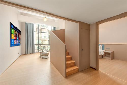 Imagen de la habitación del Hotel Yizhi - Guangzhou Tower Metro Station Pazhou Convention and Exhibition Center Branch. Foto 20