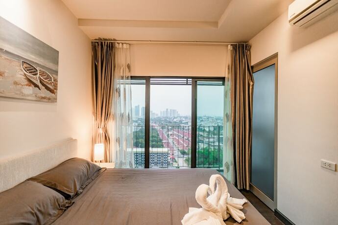 Imagen de la habitación del Hotel Yk Condotel Pattaya. Foto 15