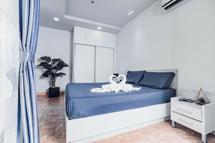 Imagen de la habitación del Hotel Yk Condotel Pattaya. Foto 17