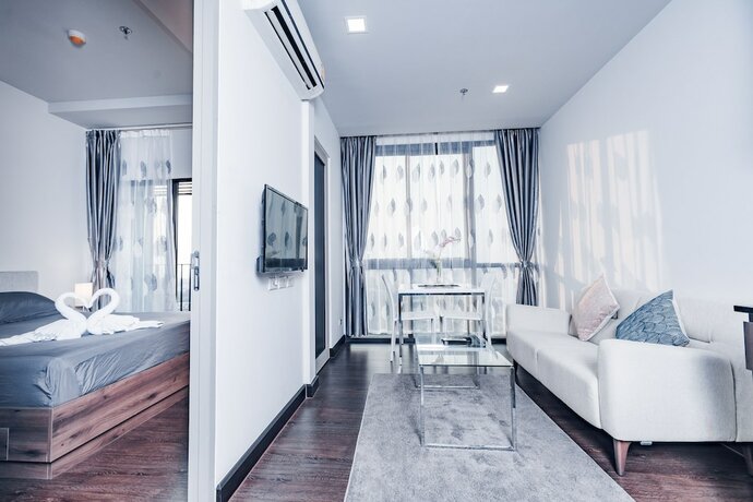 Imagen de la habitación del Hotel Yk Condotel Pattaya. Foto 18