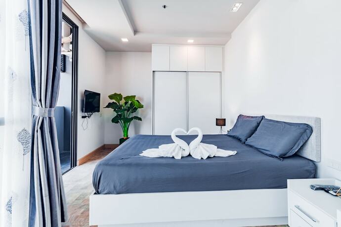 Imagen de la habitación del Hotel Yk Condotel Pattaya. Foto 19