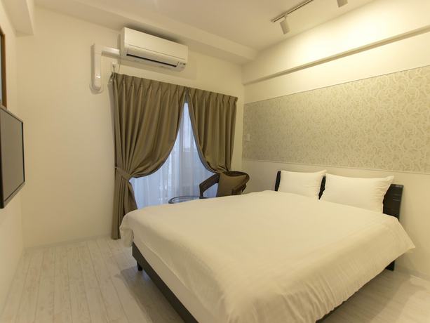 Imagen de la habitación del Hotel Y&lsquo; Rise To Itoman. Foto 11