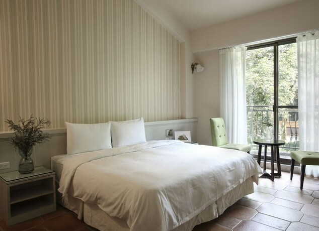 Imagen de la habitación del Hotel Yo Shen Jing Resort. Foto 22