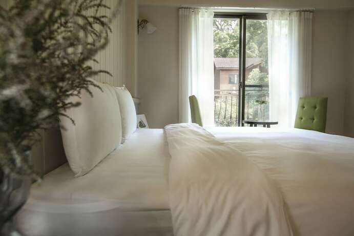 Imagen de la habitación del Hotel Yo Shen Jing Resort. Foto 25