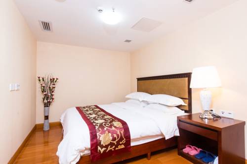 Imagen de la habitación del Hotel Yo Yo Apartment Zheng Jia Dong Fang Branch. Foto 1