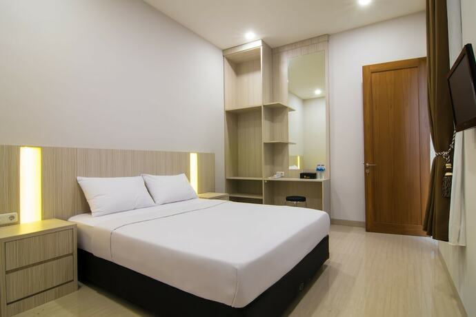 Imagen de la habitación del Hotel Yobel Guest House. Foto 13