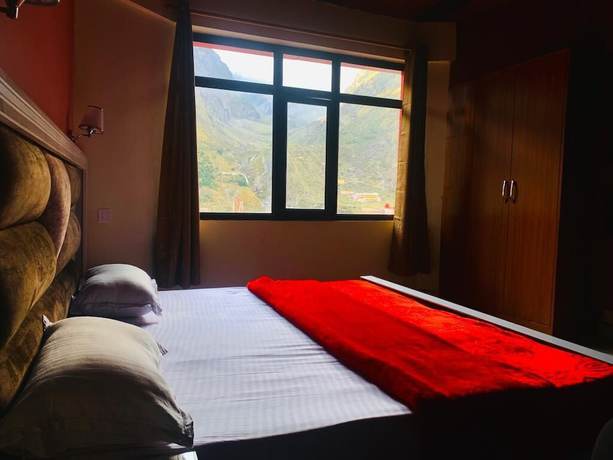 Imagen de la habitación del Hotel Yoga Badrinath Dham. Foto 20