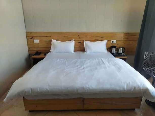 Imagen de la habitación del Hotel Yoga Rishi. Foto 11