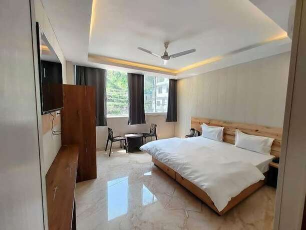 Imagen de la habitación del Hotel Yoga Rishi. Foto 12