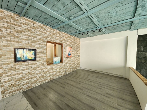 Imagen de la habitación del Hotel YogaHome. Foto 10