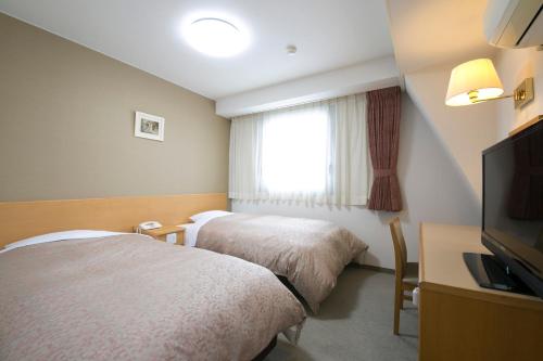 Imagen de la habitación del Hotel Yokaichi Royal. Foto 6