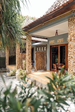 Imagen de la habitación del Hotel Yoki\'s Bungalows. Foto 5