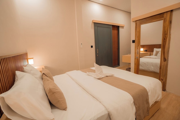 Imagen de la habitación del Hotel Yoki\'s Bungalows. Foto 7