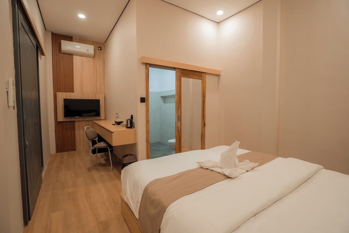 Imagen de la habitación del Hotel Yoki\'s Bungalows. Foto 8