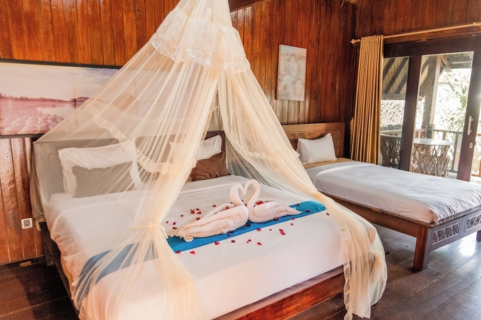 Imagen de la habitación del Hotel Yoki\'s Bungalows. Foto 9