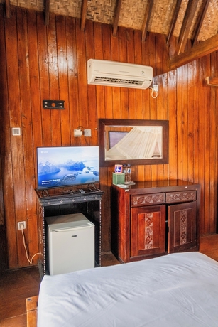 Imagen de la habitación del Hotel Yoki\'s Bungalows. Foto 10