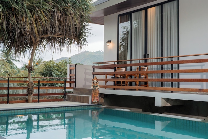 Imagen de la habitación del Hotel Yoki\'s Bungalows. Foto 13