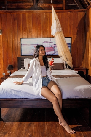 Imagen de la habitación del Hotel Yoki\'s Bungalows. Foto 16