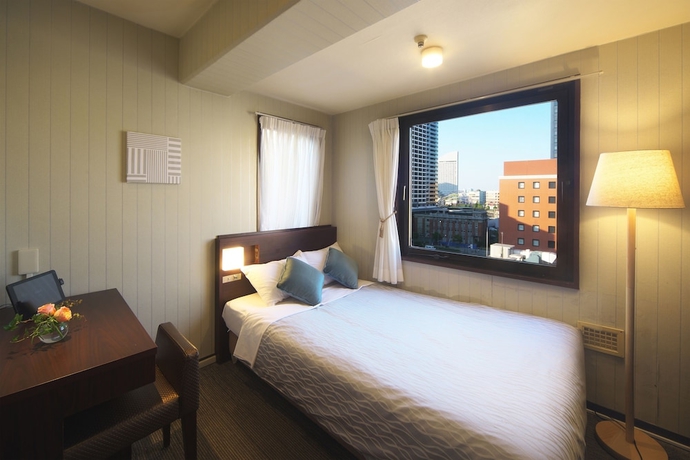 Imagen de la habitación del Hotel Yokohama Heiwa Plaza. Foto 2