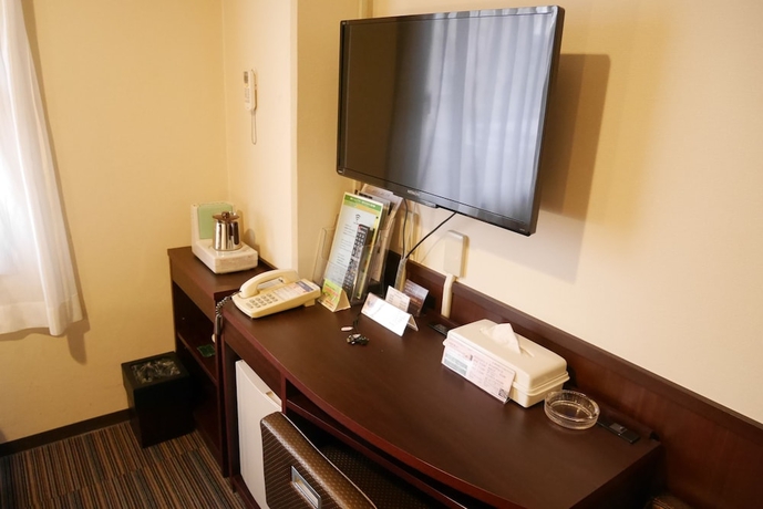 Imagen de la habitación del Hotel Yokohama Heiwa Plaza. Foto 12