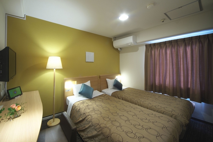 Imagen de la habitación del Hotel Yokohama Heiwa Plaza. Foto 14