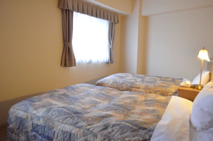 Imagen de la habitación del Hotel Yokohama Mandarin. Foto 3