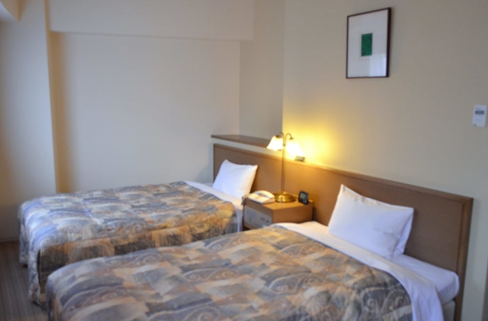 Imagen de la habitación del Hotel Yokohama Mandarin. Foto 14