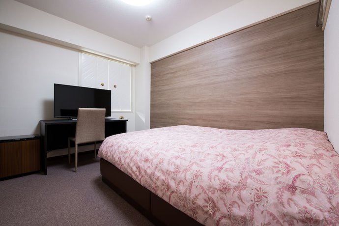 Imagen de la habitación del Hotel Yokohama Sakuragicho Town 24. Foto 10