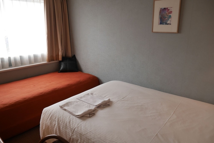 Imagen de la habitación del Hotel Yokohama Techno Tower. Foto 5