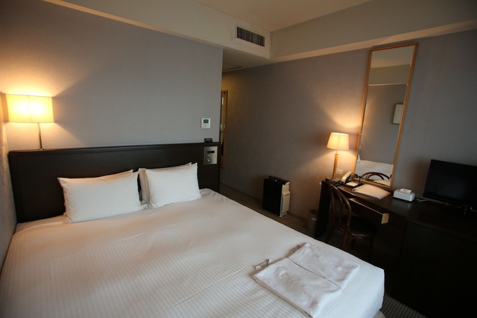 Imagen de la habitación del Hotel Yokohama Techno Tower. Foto 17