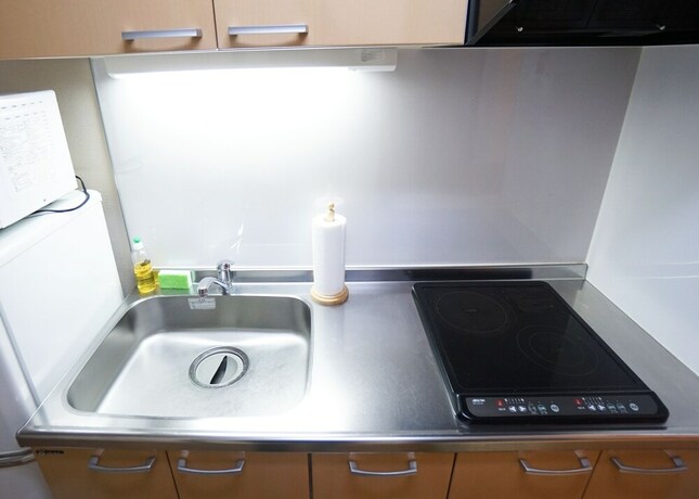 Imagen de la habitación del Hotel Yokohama The Apartment. Foto 23