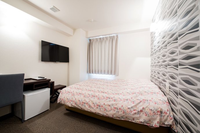 Imagen de la habitación del Hotel Yokohama Town 24. Foto 8