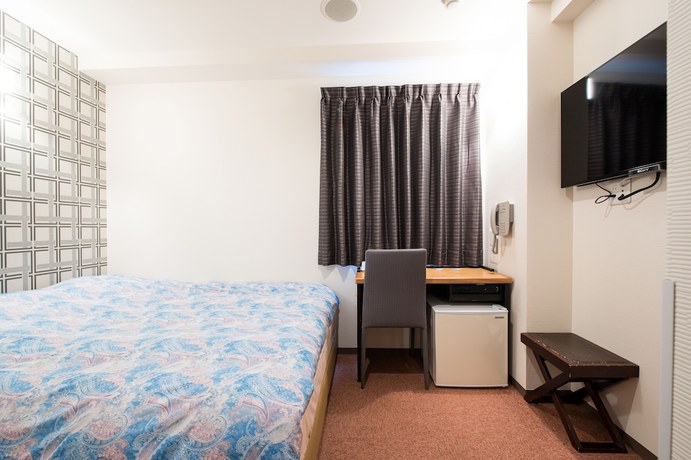 Imagen de la habitación del Hotel Yokohama Town 24. Foto 9