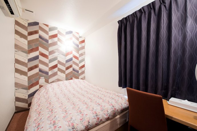 Imagen de la habitación del Hotel Yokohama Town 24. Foto 12
