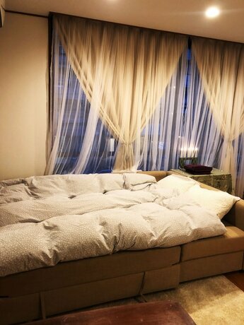 Imagen general del Hotel Yokohama World Family House. Foto 12