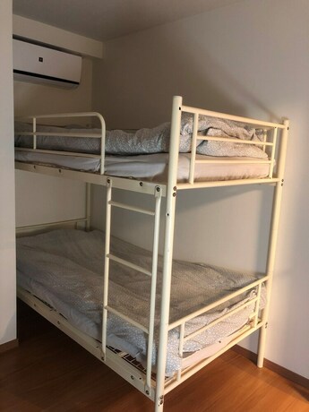 Imagen de la habitación del Hotel Yokohama World Family House. Foto 17