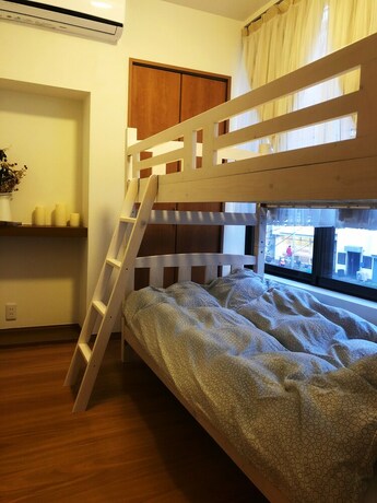 Imagen de la habitación del Hotel Yokohama World Family House. Foto 23
