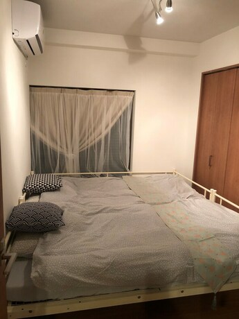 Imagen de la habitación del Hotel Yokohama World Family House. Foto 24