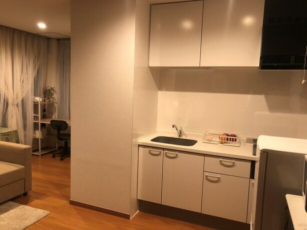 Imagen de la habitación del Hotel Yokohama World Family House. Foto 30
