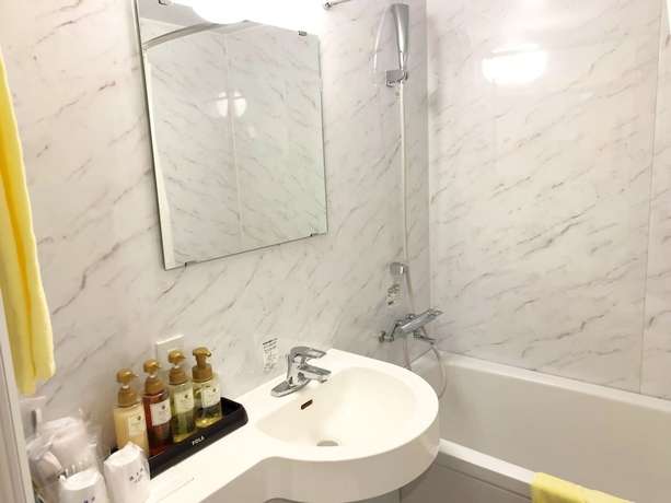 Imagen de la habitación del Hotel Yokote Plaza Hotel. Foto 18
