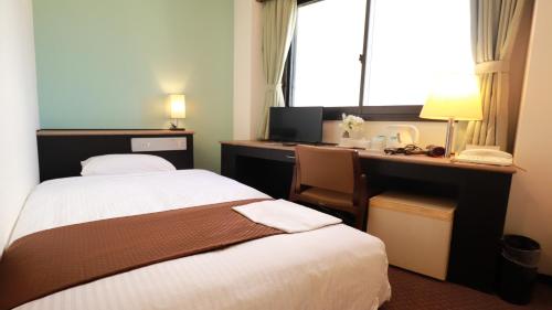 Imagen de la habitación del Hotel 米子シティガーデンズホテル Yonago Citygardens. Foto 6