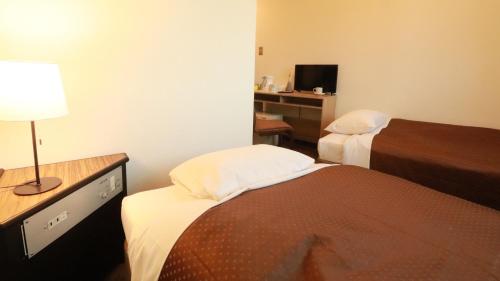 Imagen de la habitación del Hotel 米子シティガーデンズホテル Yonago Citygardens. Foto 8